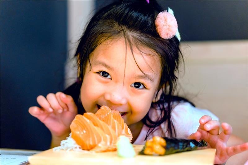 Seafood-Salmon-Girl-shutterstock_1563909859-EDIT